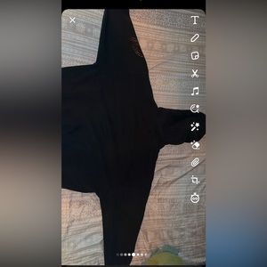 Worn Black PacSun hoodie with pink rhinestones along the sleeve and left chest